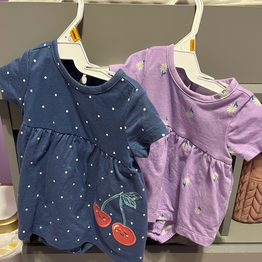 Carter's Purple Baby Rompers and toy